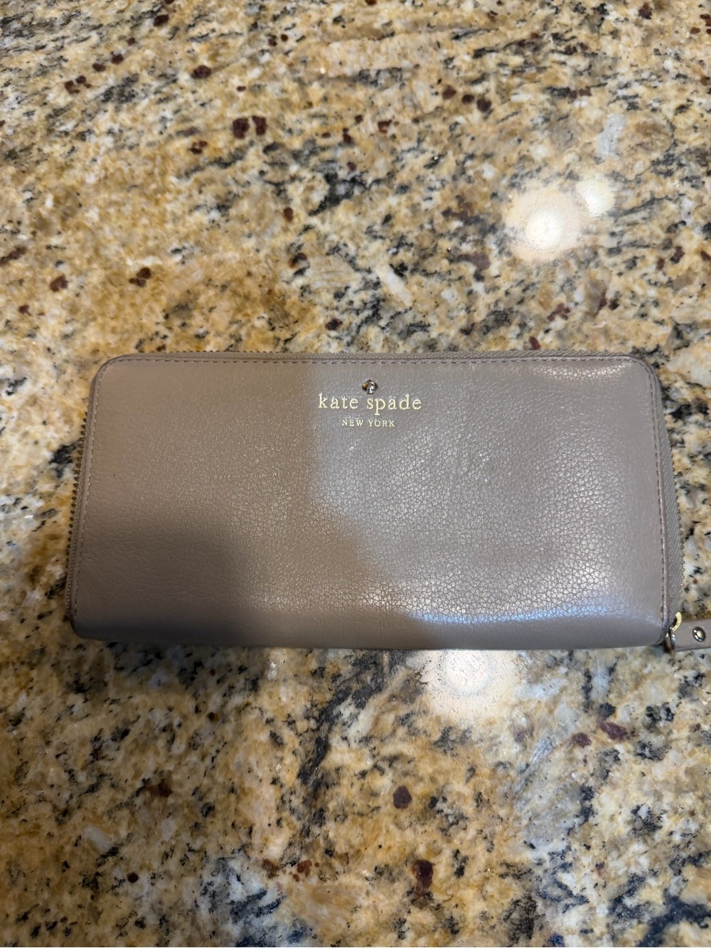 kate spade leather zip-around wallet in taupe gray